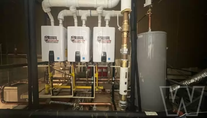 https://wootenplumbing.com/wp-content/uploads/wooten-plumbing-commercial-tankless-water-heaters-1.webp
